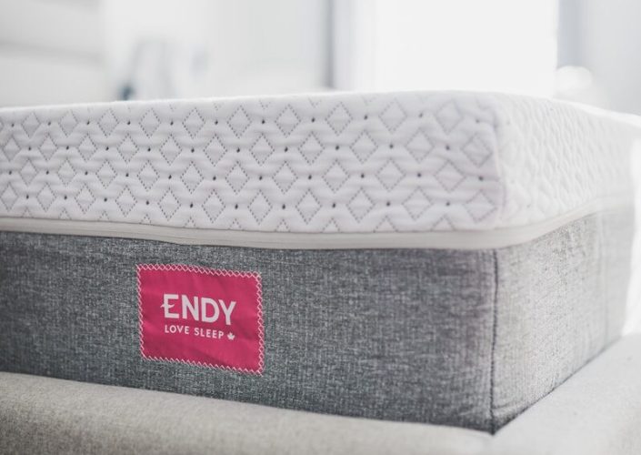 a close up of a mattress on a couch
